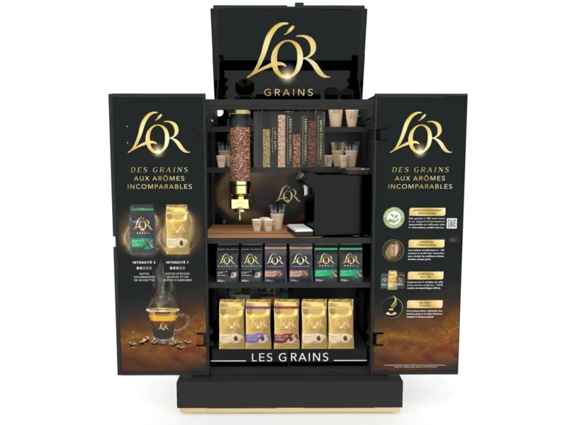 L'Or · corner promo Les Grains avec machine à café en magasin
